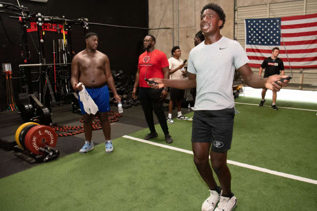 Then-Spain Park player Jared Smith jumps rope to warm up for drills in 2022. Smith is now at Thompson High School (Alabama).