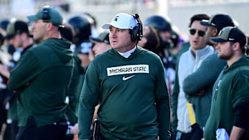 Nov 2, 2024; East Lansing, Michigan, USA;  Michigan State Spartans head coach Jonathan Smith looks over his sidelines during the first quarter against the Indiana Hoosiers at Spartan Stadium. Mandatory Credit: Dale Young-Imagn Images