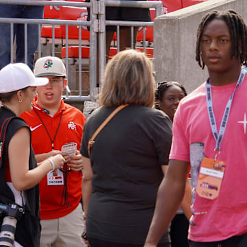 Sept. 21, 2024; Columbus, Ohio, USA; Glassboro (New Jersey) athlete Xavier Sabb watches warm-ups before Ohio State's game against the Marshall University Thundering Herd at Ohio Stadium.