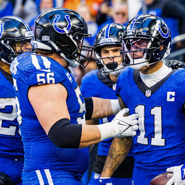 Indianapolis Colts wide receiver Michael Pittman Jr. (11) celebrates his touchdown with teammates in the second half against the Cleveland Browns at Lucas Oil Stadium.