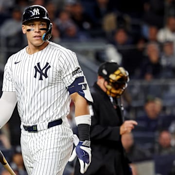 Oct 8, 2025; Bronx, New York, USA; New York Yankees right fielder Aaron Judge (99) reacts to striking during the eighth inning against the Toronto Blue Jays during game four of the ALDS round for the 2025 MLB playoffs at Yankee Stadium. Mandatory Credit: Brad Penner-Imagn Images