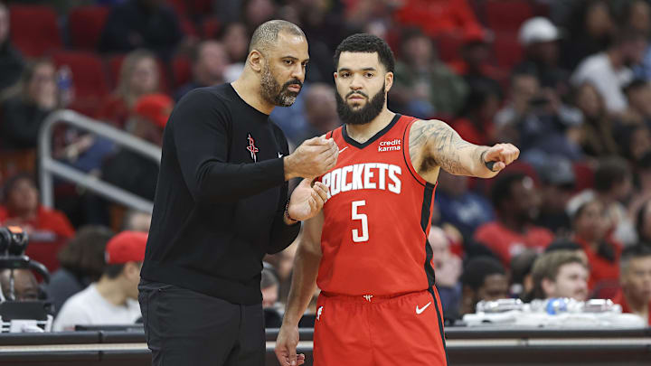 Dec 11, 2023; Houston, Texas, USA; Houston Rockets head coach Ime Udoka talks with guard Fred VanVleet (5) during the second quarter against the San Antonio Spurs at Toyota Center. Mandatory Credit: Troy Taormina-Imagn Images