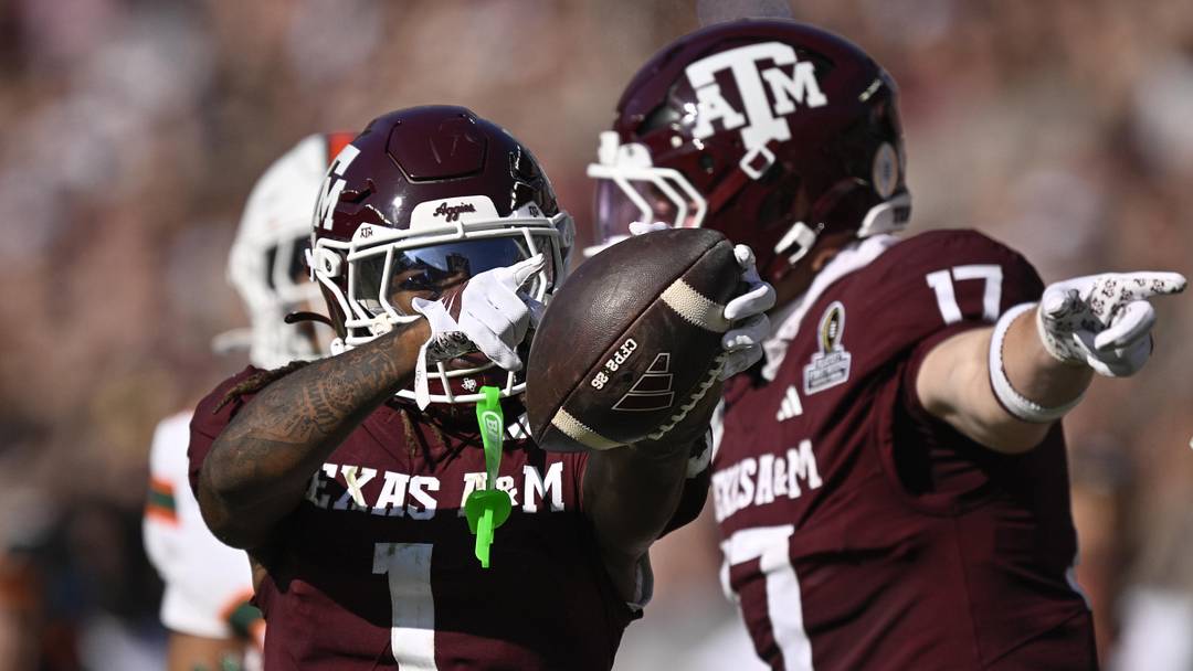 Dec 20, 2025; College Station, TX, USA; Texas A&M Aggies wide receiver Mario Craver (1) and Texas A&M Aggies tight end Theo Melin Öhrström (17) celebrate a first down against the Miami Hurricanes during the second half of the first round game of the CFP National Playoff at Kyle Field. Mandatory Credit: Jerome Miron-Imagn Images Dec 20, 2025; College Station, TX, USA; Texas A&M Aggies wide receiver Mario Craver (1) and Texas A&M Aggies tight end Theo Melin Öhrström (17) celebrate a first down against the Miami Hurricanes during the second half of the first round game of the CFP National Playoff at Kyle Field. Mandatory Credit: Jerome Miron-Imagn Images
