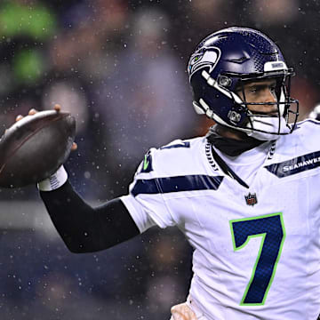 Dec 26, 2024; Chicago, Illinois, USA; Seattle Seahawks quarterback Geno Smith (7) passes the ball against the Chicago Bears during the third quarter at Soldier Field. Mandatory Credit: Daniel Bartel-Imagn Images