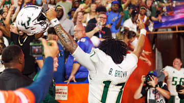 Sep 6, 2025; Gainesville, Florida, USA; South Florida Bulls quarterback Byrum Brown (17) gestures towards fans after a game against the Florida Gators at Ben Hill Griffin Stadium. Mandatory Credit: Matt Pendleton-Imagn Images