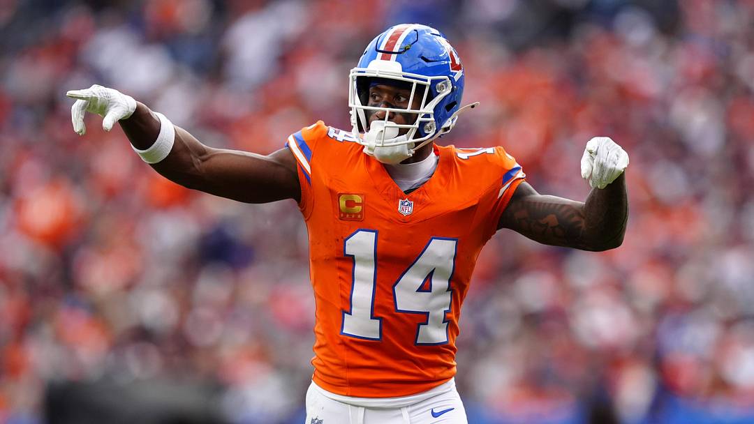 Oct 26, 2025; Denver, Colorado, USA; Denver Broncos wide receiver Courtland Sutton (14) reacts in the fourth quarter against the Dallas Cowboys at Empower Field at Mile High. Mandatory Credit: Ron Chenoy-Imagn Images