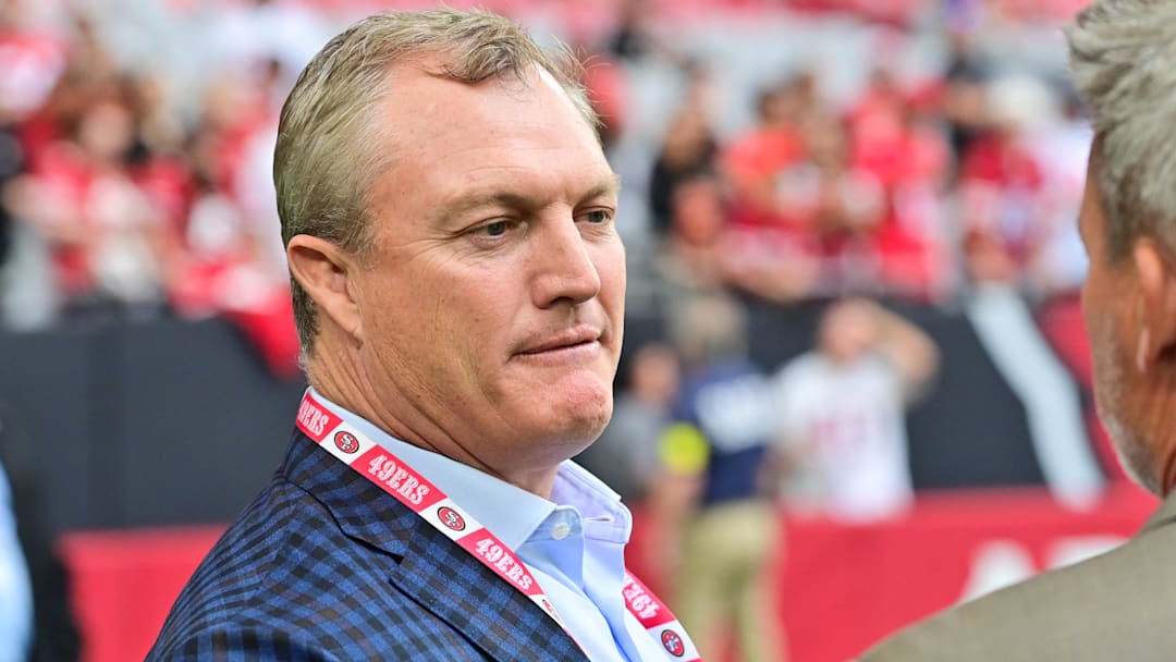 Nov 16, 2025; Glendale, Arizona, USA; San Francisco 49ers general manager John Lynch speaks on the sidelines before the game against the Arizona Cardinals at State Farm Stadium. Mandatory Credit: Matt Kartozian-Imagn Images