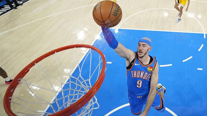 Jun 22, 2025; Oklahoma City, Oklahoma, USA; Oklahoma City Thunder guard Alex Caruso (9) dunks against the Indiana Pacers during the first half of game seven of the 2025 NBA Finals at Paycom Center. Mandatory Credit: Kyle Terada-Imagn Images