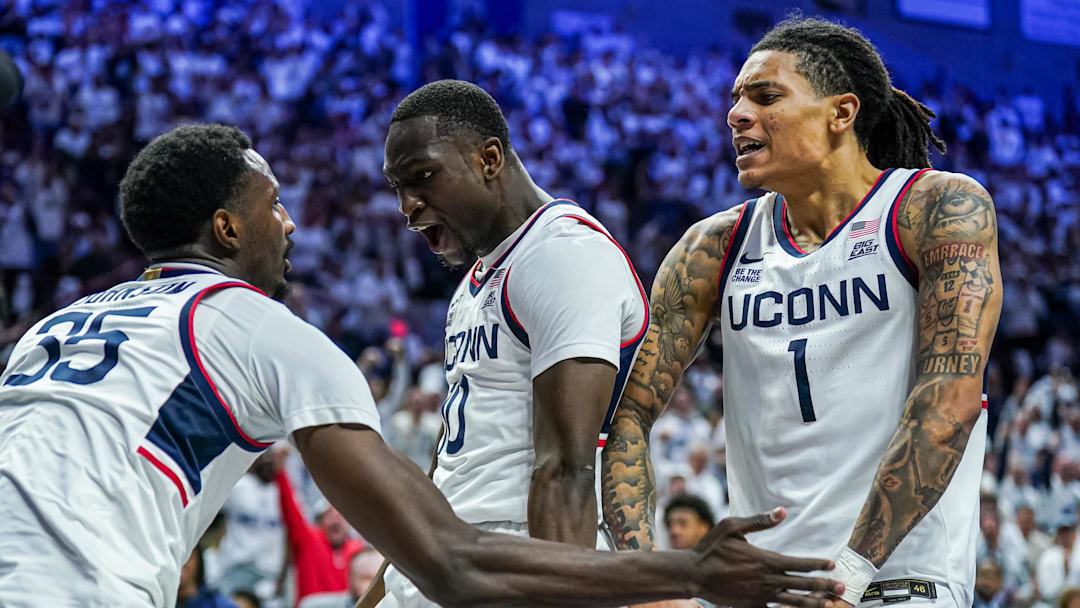 Mar 5, 2025; Storrs, Connecticut, USA; UConn Huskies guard Hassan Diarra (10) and guard Solo Ball (1) react after center Samson Johnson (35) makes a basket against the Marquette Golden Eagles in the second half at Harry A. Gampel Pavilion. Mandatory Credit: David Butler II-Imagn Images