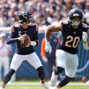 Chicago Bears quarterback Caleb Williams (18) drops back to pass against the Tennessee Titans in the first quarter of their game at Soldier Field in Chicago, Ill., Sunday, Sept. 8, 2024.