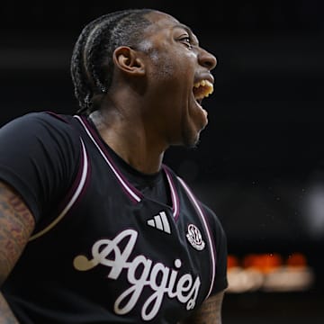 Feb 8, 2025; Columbia, Missouri, USA; Texas A&M Aggies guard Wade Taylor IV (4) celebrates after a play during the first half against the Missouri Tigers at Mizzou Arena. Mandatory Credit: Jay Biggerstaff-Imagn Images