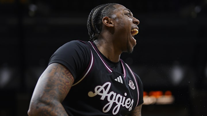 Feb 8, 2025; Columbia, Missouri, USA; Texas A&M Aggies guard Wade Taylor IV (4) celebrates after a play during the first half against the Missouri Tigers at Mizzou Arena. Mandatory Credit: Jay Biggerstaff-Imagn Images