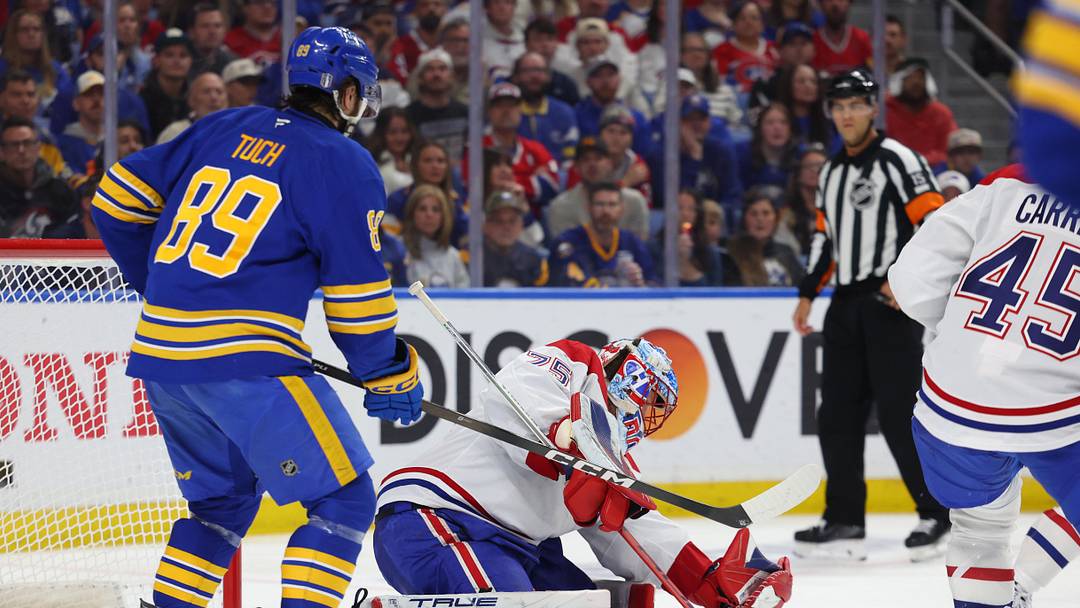 May 8, 2026; Buffalo, New York, USA; Buffalo Sabres right wing Alex Tuch (89) looks for a rebound as Montréal Canadiens goaltender Jakub Dobes (75) looks to make a save during the second period in game two of the second round of the 2026 Stanley Cup Playoffs at KeyBank Center. Mandatory Credit: Timothy T. Ludwig-Imagn Images