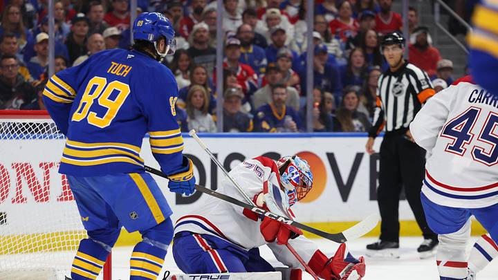 May 8, 2026; Buffalo, New York, USA; Buffalo Sabres right wing Alex Tuch (89) looks for a rebound as Montréal Canadiens goaltender Jakub Dobes (75) looks to make a save during the second period in game two of the second round of the 2026 Stanley Cup Playoffs at KeyBank Center. Mandatory Credit: Timothy T. Ludwig-Imagn Images