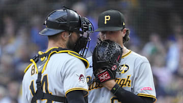 Aug 13, 2025; Milwaukee, Wisconsin, USA; Pittsburgh Pirates pitcher Kyle Nicolas (66) has a talk with catcher Joey Bart (14) in the sixth inning against the Milwaukee Brewers at American Family Field. Mandatory Credit: Michael McLoone-Imagn Images
