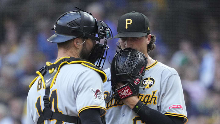 Aug 13, 2025; Milwaukee, Wisconsin, USA; Pittsburgh Pirates pitcher Kyle Nicolas (66) has a talk with catcher Joey Bart (14) in the sixth inning against the Milwaukee Brewers at American Family Field. Mandatory Credit: Michael McLoone-Imagn Images