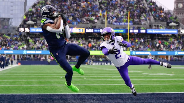 Seattle Seahawks wide receiver DK Metcalf (14) catches a pass for a touchdown