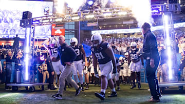 Penn State football head coach James Franklin leading Nittany Lions onto the field