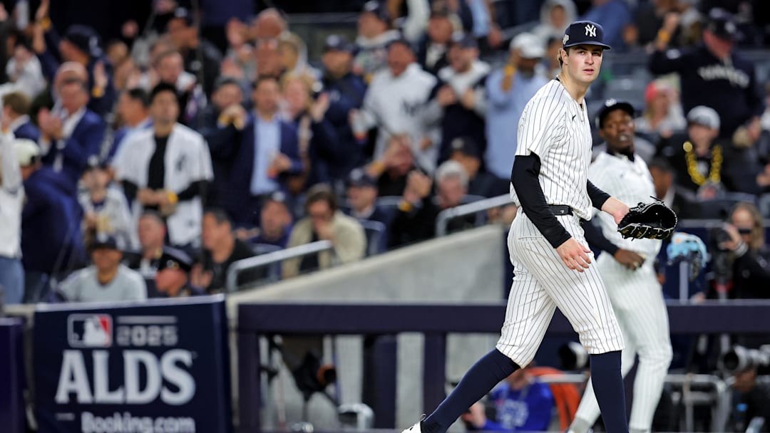 Oct 8, 2025; Bronx, New York, USA; New York Yankees pitcher Cam Schlittler (31) celebrates after the sixth inning against the Toronto Blue Jays during game four of the ALDS round for the 2025 MLB playoffs at Yankee Stadium. Mandatory Credit: Brad Penner-Imagn Images