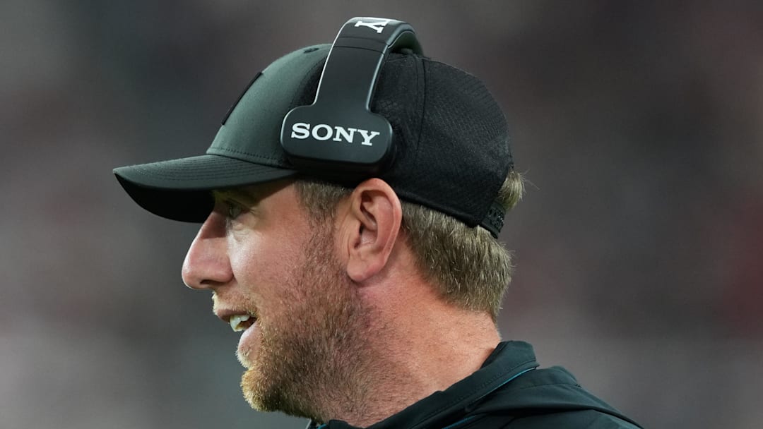 Nov 23, 2025; Glendale, Arizona, USA; Jacksonville Jaguars head coach Liam Coen looks on during the third quarter against the Arizona Cardinals at State Farm Stadium. Mandatory Credit: Joe Camporeale-Imagn Images
