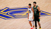 Jun 13, 2022; San Francisco, California, USA; Golden State Warriors guard Stephen Curry (30) and Boston Celtics forward Jayson Tatum (0) during the third quarter in game five of the 2022 NBA Finals at Chase Center. 