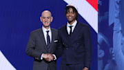 Jun 25, 2025; Brooklyn, NY, USA;  Tre Johnson stands with NBA commissioner Adam Silver after being selected as the sixth pick by the Washington Wizards in the first round of the 2025 NBA Draft at Barclays Center. Mandatory Credit: Brad Penner-Imagn Images
