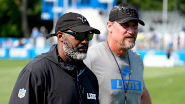 Detroit Lions executive vice president and general manager Brad Holmes, left, and Lions head coach Dan Campbell head off the practice field at the team's training facility in Allen Park on Wednesday, Aug. 14, 2024.