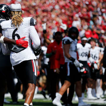 Cincinnati Bearcats head coach Luke Fickell reacts as safety Bryan Cook (6) is penalized for removing his helmet after intercepting a pass in the end zone in the second quarter of the NCAA football game between the Indiana Hoosiers and the Cincinnati Bearcats at Memorial Stadium in Bloomington, Ind., on Saturday, Sept. 18, 2021.

Cincinnati Bearcats At Indiana Hoosiers Football