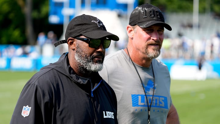 Detroit Lions executive vice president and general manager Brad Holmes, left, and Lions head coach Dan Campbell head off the practice field at the team's training facility in Allen Park on Wednesday, Aug. 14, 2024.