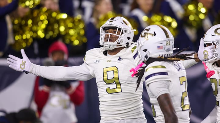 Nov 21, 2024; Atlanta, Georgia, USA; Georgia Tech Yellow Jackets defensive lineman Romello Height (9) celebrates after an interception against the North Carolina State Wolfpack in the fourth quarter at Bobby Dodd Stadium at Hyundai Field. Mandatory Credit: Brett Davis-Imagn Images Nov 21, 2024; Atlanta, Georgia, USA; Georgia Tech Yellow Jackets defensive lineman Romello Height (9) celebrates after an interception against the North Carolina State Wolfpack in the fourth quarter at Bobby Dodd Stadium at Hyundai Field. Mandatory Credit: Brett Davis-Imagn Images