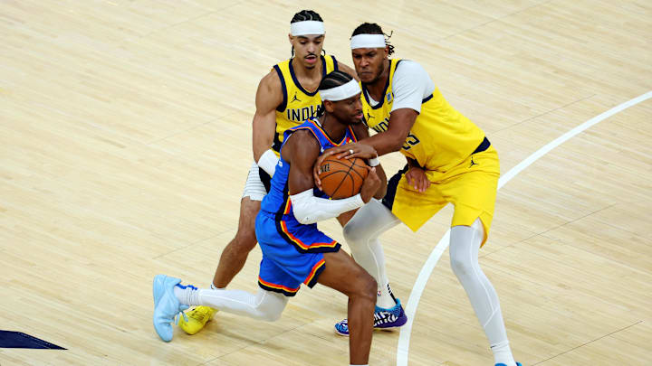 Jun 11, 2025; Indianapolis, Indiana, USA; Oklahoma City Thunder guard Shai Gilgeous-Alexander (2) drives to the basket against Indiana Pacers center Myles Turner (33) and guard Andrew Nembhard (2) during the third quarter in game three of the 2025 NBA Finals at Gainbridge Fieldhouse. Mandatory Credit: Trevor Ruszkowski-Imagn Images Jun 11, 2025; Indianapolis, Indiana, USA; Oklahoma City Thunder guard Shai Gilgeous-Alexander (2) drives to the basket against Indiana Pacers center Myles Turner (33) and guard Andrew Nembhard (2) during the third quarter in game three of the 2025 NBA Finals at Gainbridge Fieldhouse. Mandatory Credit: Trevor Ruszkowski-Imagn Images
