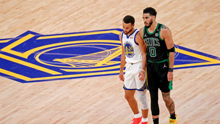 Jun 13, 2022; San Francisco, California, USA; Golden State Warriors guard Stephen Curry (30) and Boston Celtics forward Jayson Tatum (0) during the third quarter in game five of the 2022 NBA Finals at Chase Center. 