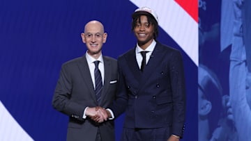 Jun 25, 2025; Brooklyn, NY, USA;  Tre Johnson stands with NBA commissioner Adam Silver after being selected as the sixth pick by the Washington Wizards in the first round of the 2025 NBA Draft at Barclays Center. Mandatory Credit: Brad Penner-Imagn Images
