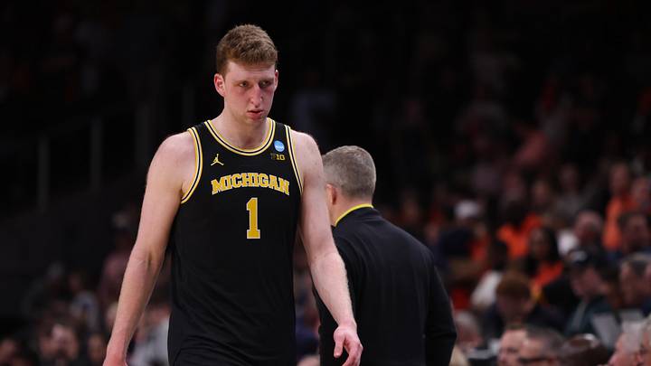 Mar 28, 2025; Atlanta, GA, USA; Michigan Wolverines center Danny Wolf (1) reacts after losing to the Auburn Tigers in a South Regional semifinal of the 2025 NCAA tournament at State Farm Arena. Mandatory Credit: Brett Davis-Imagn Images