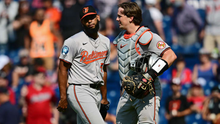 Aug 4, 2024; Cleveland, Ohio, USA; Baltimore Orioles relief pitcher Seranthony Dominguez (56) is congratulated by catcher Adley Rutschman (35) after defeating the Cleveland Guardians at Progressive Field. 