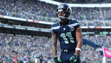Nov 9, 2025; Seattle, Washington, USA;  Seattle Seahawks wide receiver Jaxon Smith-Njigba (11) celebrates after scoring a touchdown during the first quarter against the Arizona Cardinals at Lumen Field. 