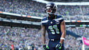 Nov 9, 2025; Seattle, Washington, USA;  Seattle Seahawks wide receiver Jaxon Smith-Njigba (11) celebrates after scoring a touchdown during the first quarter against the Arizona Cardinals at Lumen Field. Mandatory Credit: Kevin Ng-Imagn Images