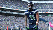 Nov 9, 2025; Seattle, Washington, USA;  Seattle Seahawks wide receiver Jaxon Smith-Njigba (11) celebrates after scoring a touchdown during the first quarter against the Arizona Cardinals at Lumen Field. 