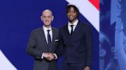 Jun 25, 2025; Brooklyn, NY, USA;  Tre Johnson stands with NBA commissioner Adam Silver after being selected as the sixth pick by the Washington Wizards in the first round of the 2025 NBA Draft at Barclays Center. Mandatory Credit: Brad Penner-Imagn Images