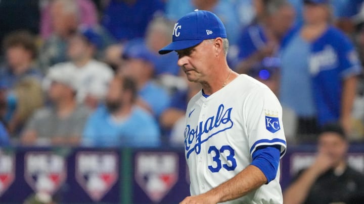 Aug 20, 2024; Kansas City, Missouri, USA; Kansas City Royals manager Matt Quatraro (33) comes to the mound for a pitcher change against the Los Angeles Angels in the seventh inning at Kauffman Stadium. Mandatory Credit: Denny Medley-USA TODAY Sports