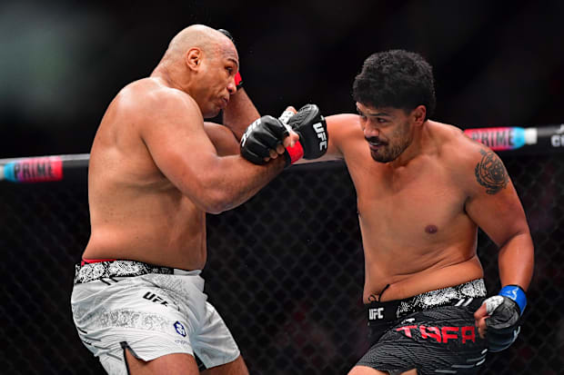 Junior Tafa lands a hit against Marcos Rogerio de Lima during UFC 298 at Honda Center. 