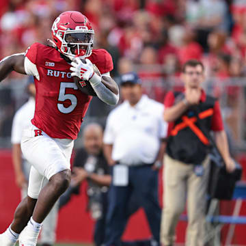 Rutgers Scarlet Knights running back Kyle Monangai (5) carries the ball 