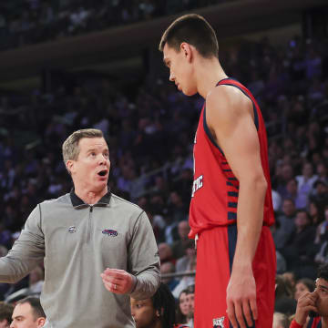 Mar 25, 2023; New York, NY, USA; Florida Atlantic Owls head coach Dusty May talks with Florida Atlantic Owls center Vladislav Goldin (50) during the first half of an NCAA tournament East Regional final against the Kansas State Wildcats at Madison Square Garden. Mandatory Credit: Brad Penner-USA TODAY Sports