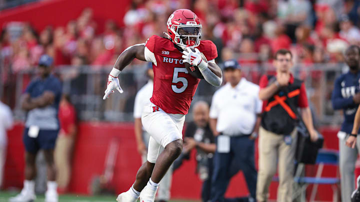 Rutgers Scarlet Knights running back Kyle Monangai (5) carries the ball 