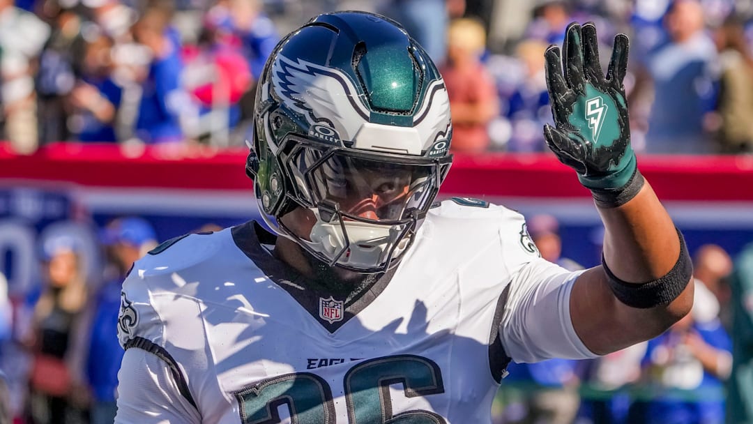 Oct 20, 2024; East Rutherford, New Jersey, USA; Philadelphia Eagles running back (and former NY Giants back) Saquon Barkley (26) greets fans at MetLife Stadium. Mandatory Credit: Robert Deutsch-Imagn Images Oct 20, 2024; East Rutherford, New Jersey, USA; Philadelphia Eagles running back (and former NY Giants back) Saquon Barkley (26) greets fans at MetLife Stadium. Mandatory Credit: Robert Deutsch-Imagn Images