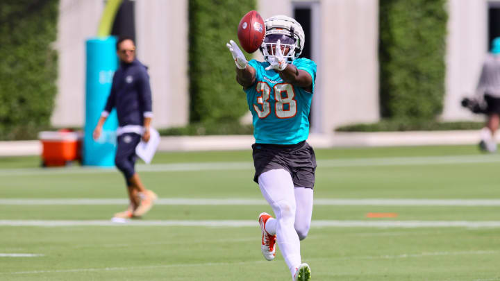 Miami Dolphins safety Mark Perry (38) catches the football during training camp at Baptist Health Training Complex.