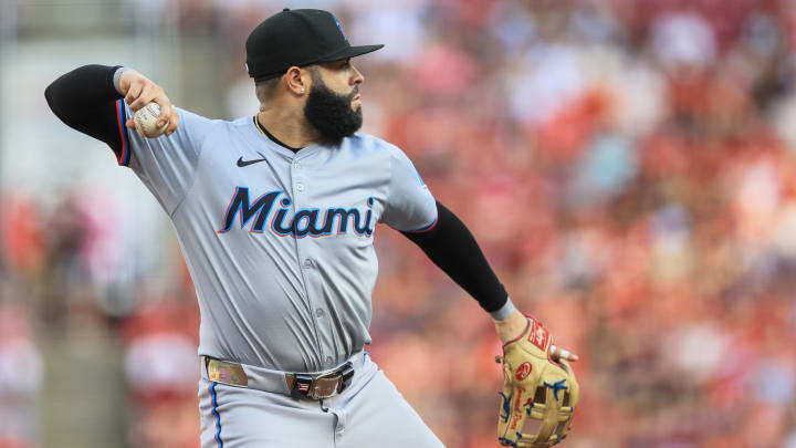 Jul 12, 2024; Cincinnati, Ohio, USA; Miami Marlins third baseman Emmanuel Rivera (15) throws to first to get Cincinnati Reds catcher Tyler Stephenson (not pictured) out in the first inning at Great American Ball Park