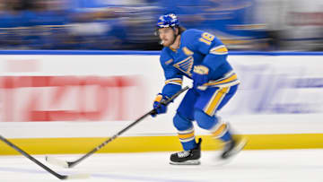 Oct 19, 2024; St. Louis, Missouri, USA;  St. Louis Blues center Robert Thomas (18) controls the puck against the Carolina Hurricanes during the second period at Enterprise Center. Mandatory Credit: Jeff Curry-Imagn Images
