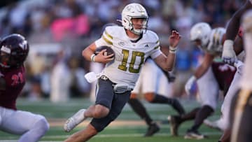 Oct 11, 2025; Atlanta, Georgia, USA; Georgia Tech Yellow Jackets quarterback Haynes King (10) runs the ball for a touchdown against the Virginia Tech Hokies in the fourth quarter at Bobby Dodd Stadium at Hyundai Field. Mandatory Credit: Brett Davis-Imagn Images