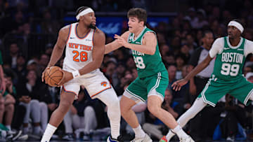 Oct 24, 2025; New York, New York, USA;  New York Knicks forward Guerschon Yabusele (28) is guarded by Boston Celtics guard Hugo Gonzalez (28) during the fourth quarter at Madison Square Garden. Mandatory Credit: Vincent Carchietta-Imagn Images